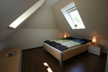 Schlafzimmer 3 im OG mit Doppelbett