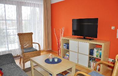 Wohnzimmer mit Zugang zur Terrasse