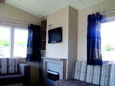 Wohnbereich mit Kabel-TV und DVD-Player