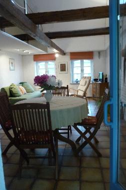 EG Esszimmer mit Sitzecke und TV