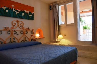 Elternschlafzimmer mit direktem Ausgang zur Veranda 