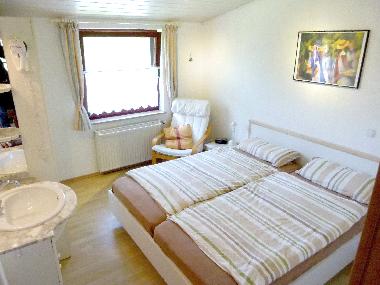 Schlafzimmer mit Doppelbetten