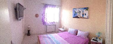 1 Schlafzimmer hat Plasma mit Sat 