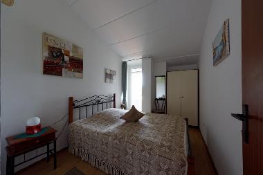 Schlafzimmer mit Meereinblick