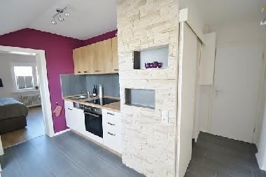 K�chenzeile mit Herd und Sp�hlmaschine