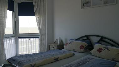 Das Schlafzimmer mit Meerblick