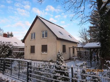 Ferienhaus im verschneiten grnen Grtel