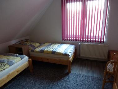 2-Bettzimmer im OG