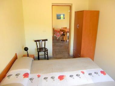 Cannonau Schlafzimmer mit Doppelbett