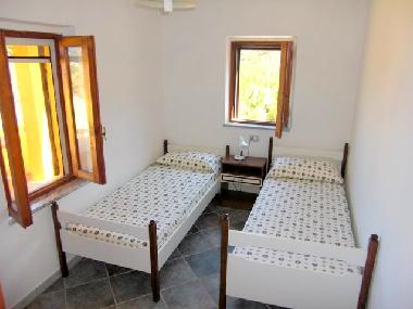Cannonau Schlafzimmer mit zwei Einzelbetten