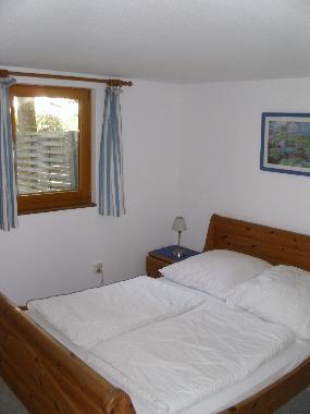 Schlafzimmer mit Doppelbett