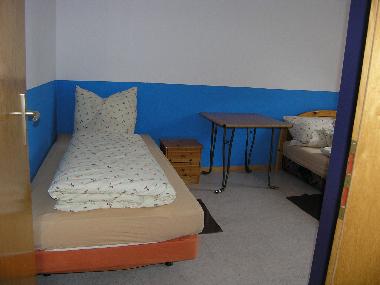 Zimmer 4: Einzelbett plus Doppelbett