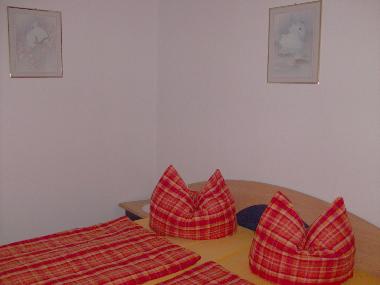 Schlafzimmer mit Doppelbett