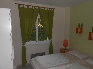 Schlafzimmer mit Doppelbett