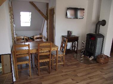 Dachgeschosswohnung mit Kaminofen.