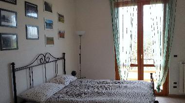 Schlafzimmer mit Balkon