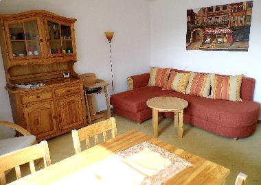 Wohnzimmer mit Ecksofa / umbaubar zum Doppelbett