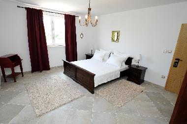 Schlafzimmer 1 mit groem Doppelbett (180x200cm) ...