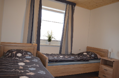 Schlafzimmer mit 2 Betten