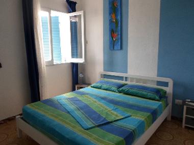 Schlafzimmer mit  Aussicht aufs Meer