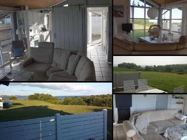 Wohnzimmer mit super Aussicht. In hellen und freund-lichen Farben. Klasse Panoramablick nach S�d + O