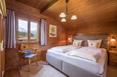 Schlafzimmer im Ferienhaus Seerose im Hotelgarten