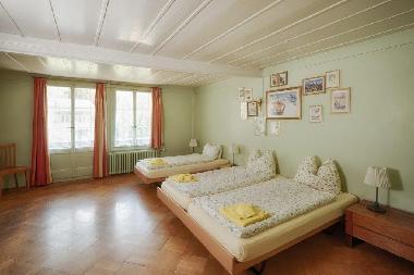 CityChalet historic Apartment Dreibettzimmer