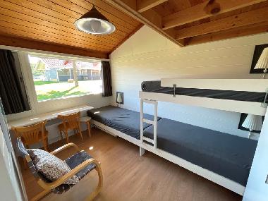 Das zweite Zimmer hat drei Betten